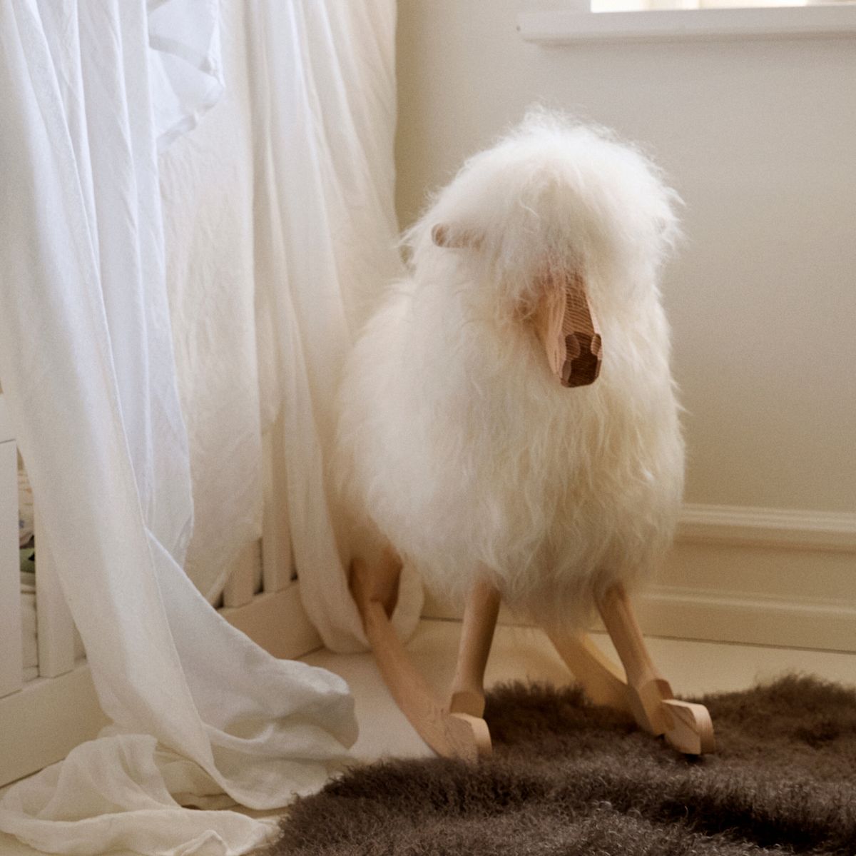 Schommelschaap | Langharig | L85xW25xH60 cm Natuurlijk Zwart